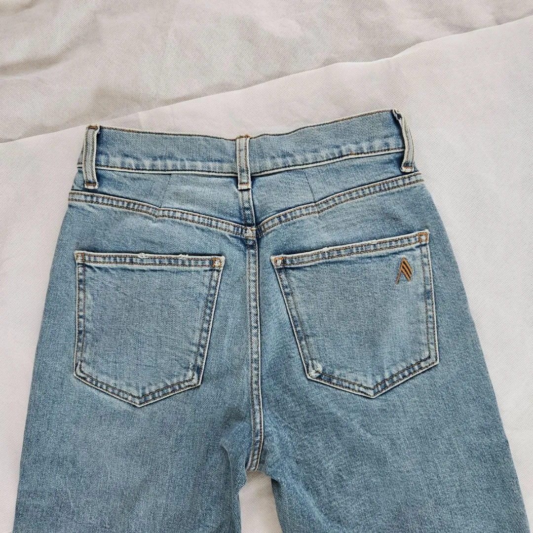 Attico blue denim jeans with slit