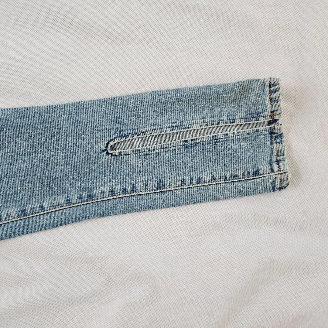 Attico blue denim jeans with slit