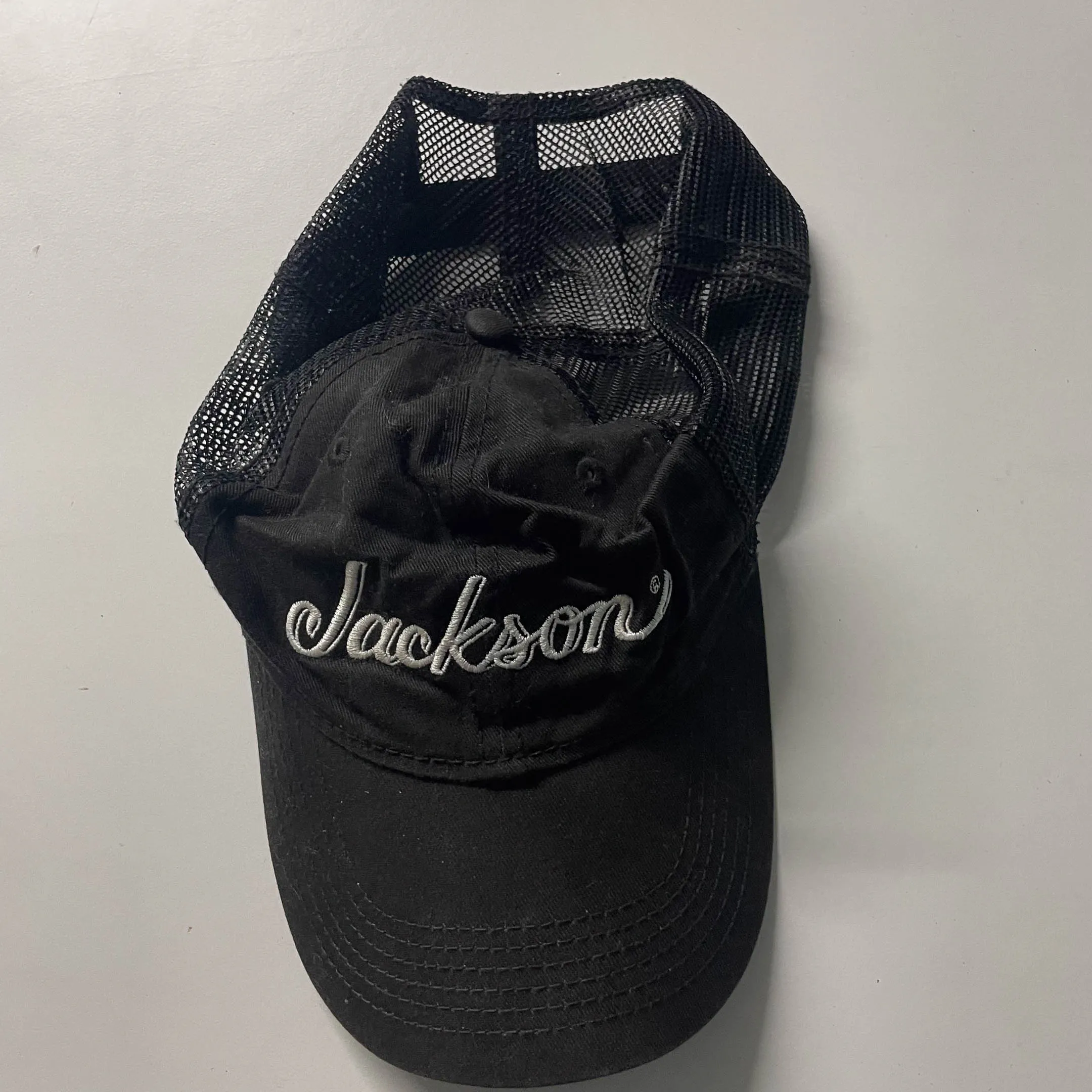 Vintage black jackson guitars logo trucker cap